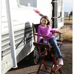Kenzie hanging  her trailer for movie Life Saver