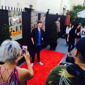 John Karna on the red carpet at the Los Angeles premiere of Premature.