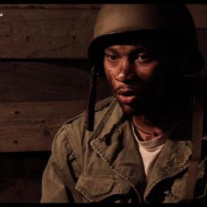 Dawayne Jordan as Private Richman in I Die Alone. 2013