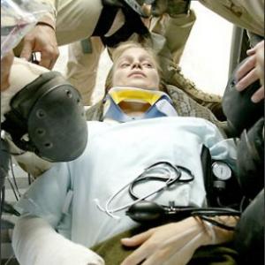 Laura Regan as Pfc. Jessica Lynch is rescued from an Iraqi hospital by American commandos in 