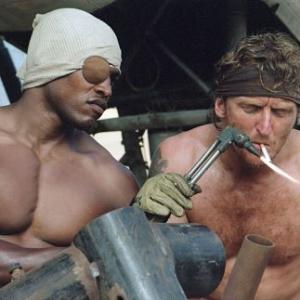Jeremy (Kirk Jones, left) and Rodney (Tony Curran) take a quick break from the rigors of their life-and-death struggle.