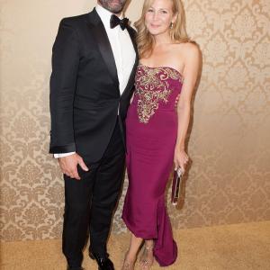 Jon Hamm and Jennifer Westfeldt at event of The 66th Primetime Emmy Awards (2014)