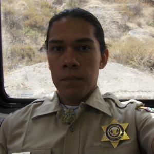 Tribal Officer Mendoza on set for Savages