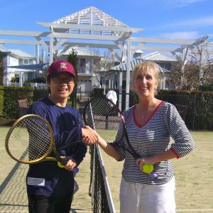 Shelley Playing tennis with a korean teacher