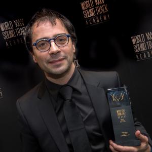 Michelino holding World Soundtrack Award 2014