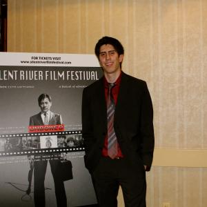 Addison Sandoval poses for photographers on the red carpet at the 2012 Silent River International Film Festival.