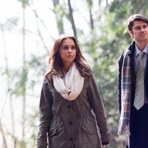 Still of Lacey Chabert and Corey Sevier in The Tree That Saved Christmas 2014