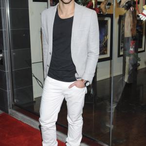 Justin Ray at the Jack Storms Fine Art Red Carpet event in Beverly Hills.