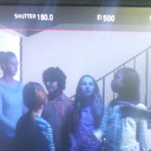 Alexis doing a scene with her friends for the Charter Commercial.