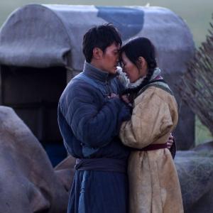 Still of Ankhnyam Ragchaa and Shaofeng Feng in Wolf Totem 2015