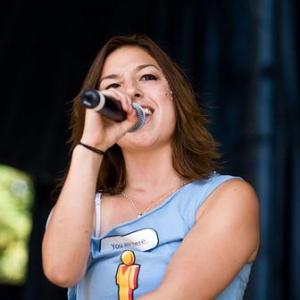 Rebecca Ahn performing onstage with 