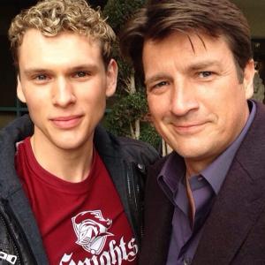Sam Towers and Nathan Fillion on the set of Castle