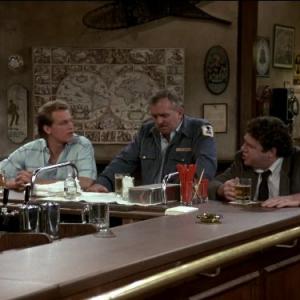 Still of Woody Harrelson, John Ratzenberger and George Wendt in Cheers (1982)