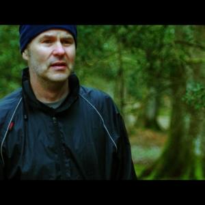 Alastair Thomson Mills as Mark in Backwoods 2015
