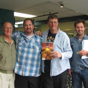 Richard Patrick Stevens  Michael Patrick Stevens with Richard Taylor holding Michaels Graphic Novel The Haunted Cavesat WETA Studios in Wellington NZ