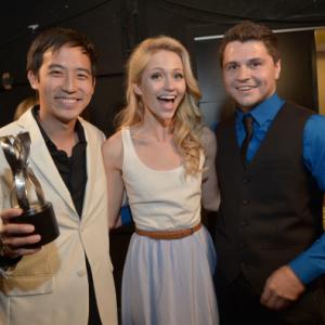 Jimmy Wong Johanna Braddy and Benji Dolly after winning the Best Ensemble Award for Video Game High School at the 2014 Streamy Awards