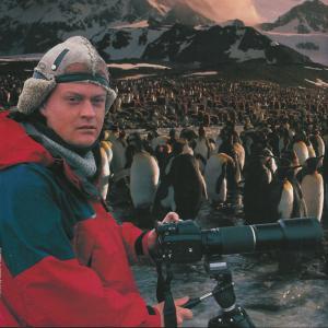 Jason Roberts with King Penguins on the island of South Georgia, sub Antarctica.