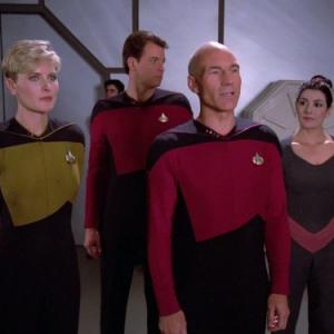 Still of Denise Crosby, Jonathan Frakes, Marina Sirtis and Patrick Stewart in Star Trek: The Next Generation (1987)
