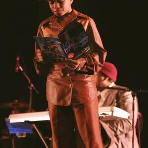 Keyon Bowman on stage as Young Michael Jackson.In this scene he's reading his comic book before Joe Jackson walks in and catch him and his brothers not practicing.