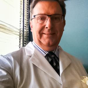 Christian J. Stewart as Dr. Charles Littman / Pathologist on 