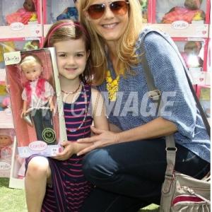 LOS ANGELES, CA - MAY 18: Christie Lynn Smith (R) and daughter, Abby Ryder Fortson attend the Corolle Adopt a Doll Event at The Grove in Los Angeles, California.