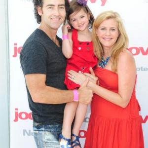Christie Lynn Smith with daughter, Abby Ryder Fortson and husband, actor John Fortson at the 2nd Annual Red CARpet Event - SLS Hotel / Beverly Hills, CA 09/08/2012