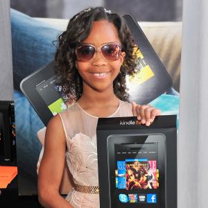 Quvenzhane Wallis poses in the Kindle Fire HD and IMDb Green Room during the 2013 Film Independent Spirit Awards at Santa Monica Beach on February 23, 2013 in Santa Monica, California.