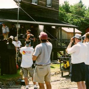 Cast and crew on location at Eckley Miner's Village in Pennsylvania, while shooting the United Studio's film, Stories from the Mines. This scene was titled, The Company Store.