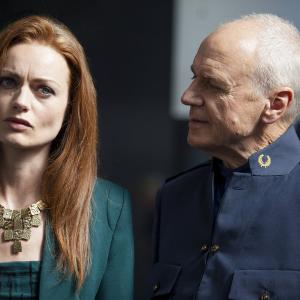 Still of Alan Dale and Rosalind Halstead in Dominion 2014