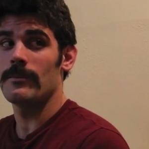 Dave Honigman and his mighty mustache in a scene directed by Dave Honigman