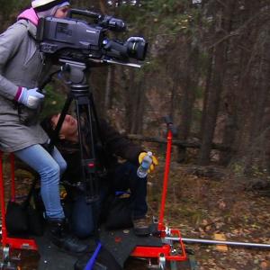 A dolly shot set up in the forest on the set of 