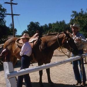Ronald Reagan with Nancy Reagan next to a horse