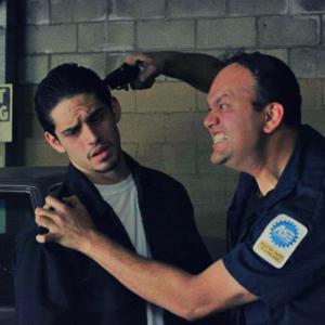 Fabian Montes directs me on how to hold someone at gun point