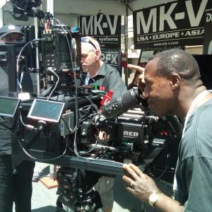 Director Bruce B Gordon inspecting a 3D RED Camera rig Cine Gear Expo at Paramount Pictures Studios