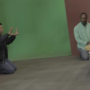 Cinematographer Tony Chiu collaborating on shot blocking with director Bruce B Gordon on the set of Whole Nother Level