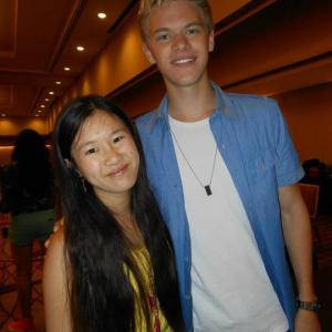 Actress Tina Q Nguyen and her friend actor Kenton Duty Shake it Up attends the Kids Help Children CHOC event at the Anaheim Hilton on August 19 2012
