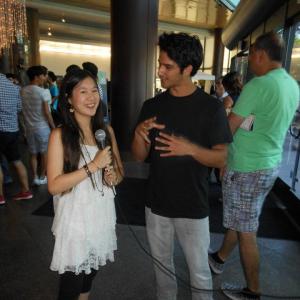 Actress Tina Q Nguyen interviews actorsinger Tyler Posey at the Los Angeles White Frog premiere on July 21 2012