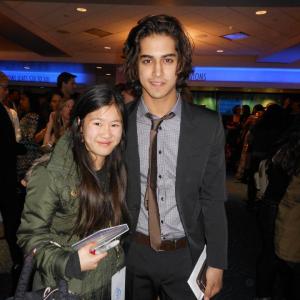 Actor Avan Jogia and Tina Q Nguyen at Lionsgate The Hunger Games world premiere at Nokia Theatre LA Live on March 12 2012