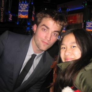 Tina Q Nguyen and actor Robert Pattinson at the Twilight Saga Breaking Dawn part 1 Los Angeles premiere