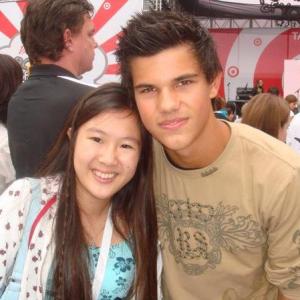 Tina Q Nguyen and actor Taylor Lautner at the Power of Youth event in 2008 at LA Live