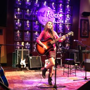Rachel Brett performing her new music at the Hard Rock Cafe.