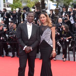 Ingrid Jean-Baptiste & Jacky Ido at Saint Laurent Red Carpet - 67th Cannes Film Festival