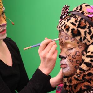 Jessica applies makeup to fellow cast member on Green Screen Adventures