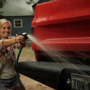 Chanelle Klabunde ambushing Neil Austin Imber in the truck wash scene in 