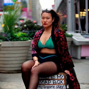Diana Oh performing her my lingerie play Installation 710 The 24 Hour Installation in Times Square wwwmylingerieplaycom