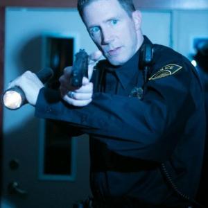 Brent Reichert as Officer Lewis in Bloody Bloody Mary Production Still