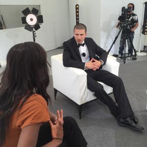 Solvan Slick Naim being interviewed at the 2015 Cannes Film Festival
