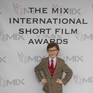 Aidan Fiske on the red carpet for the premiere of Trading Ages