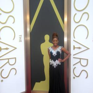 Host Tysha Williams of Studio 3 Hollywood LIVE at the 56th Annual Academy Awards Red Carpet Arrivals. In designer Shekhar Rehate gown and American Gem Company jewelry