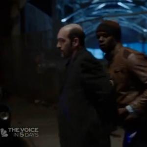 Luc Owono as a Detective arresting a drug dealer